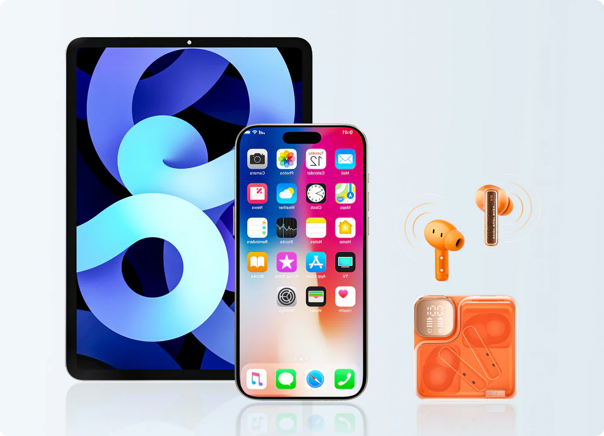 iPad, iPhone und orangefarbene kabellose Kopfhörer auf hellem Hintergrund.
