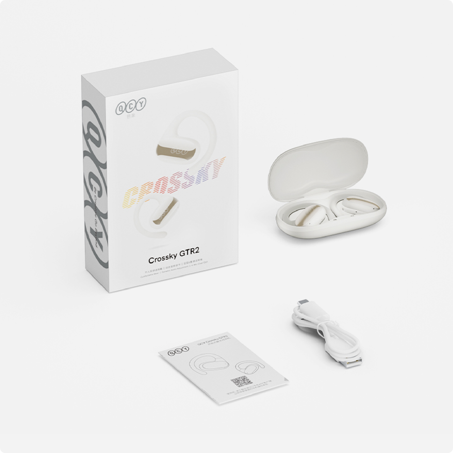 QCY Crossky GTR2 Bluetooth-Kopfhörer weiß mit Ladecase, USB-Kabel und Anleitung.